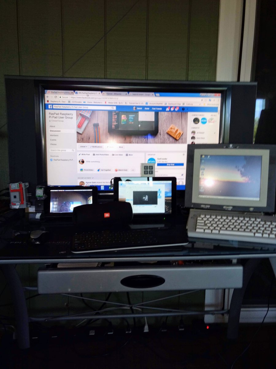Bloatedbore's tweet photo. This is a picture of me taking a picture of the RasPad playing BB King through the JBL bluetooth speaker, it will replace the 7" raspberry pi tablet to the left of it as my MP3 player out on deck. The internet appliance to the right of the RasPad is the I-Opener https://t.co/bIlax7uR0S