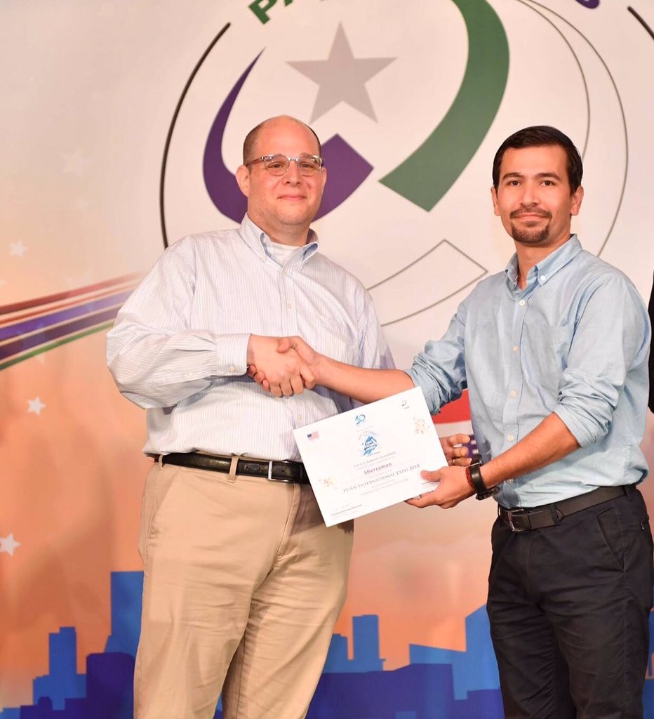 Sherzaman88's tweet photo. The moment you receive something you deserve from Matthew Singer (Country Cultural Affairs Attache ) for US Embassy in Pakistan 🇺🇸🇵🇰#MeetPakistan #PUAN10Years #PUANConference https://t.co/BKusM4NUs1