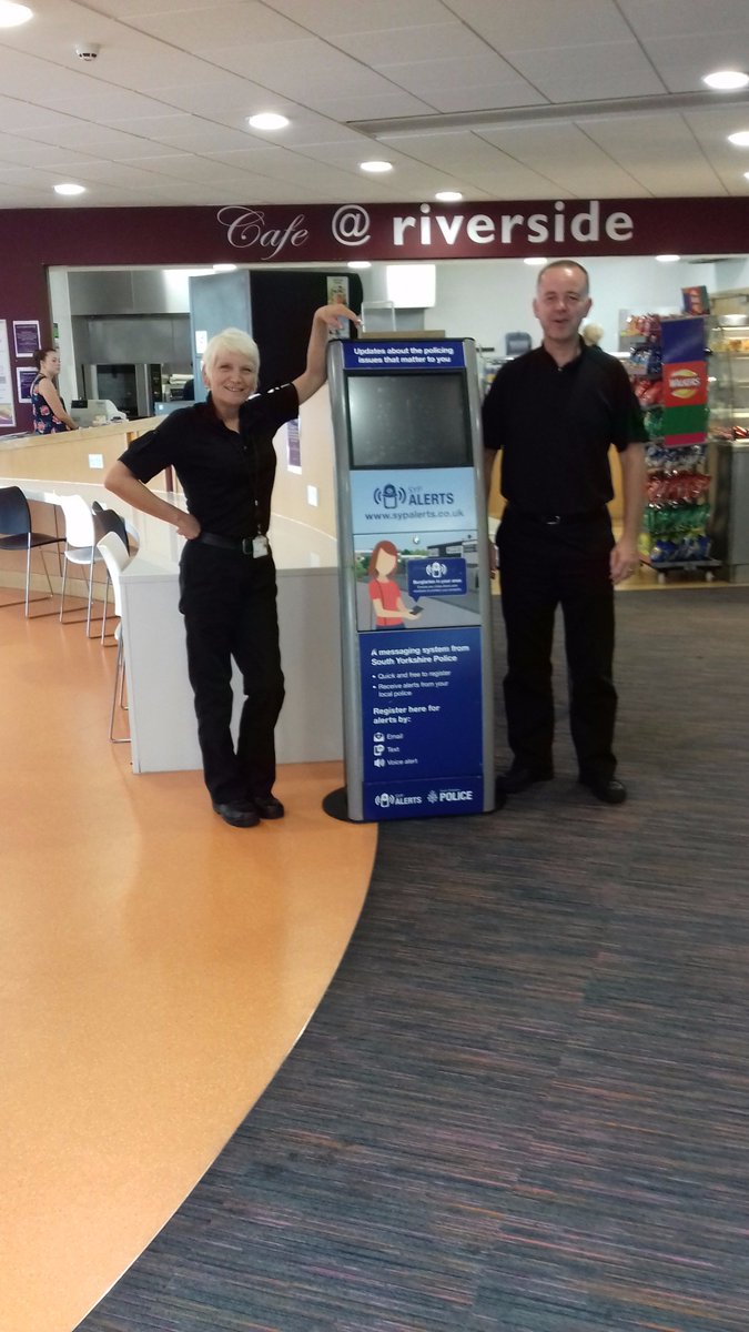 Officers with SYP Alerts kiosk in Rotherham