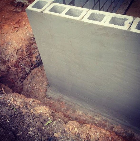 KathyatHH's tweet image. New word #parging I had never heard this term before. It is the application of a thin coat of cement or polymeric mortar applied to a concrete block wall. The first step in protecting our foundation wall from water. #hearthandhedgerow #malverncottageaddition