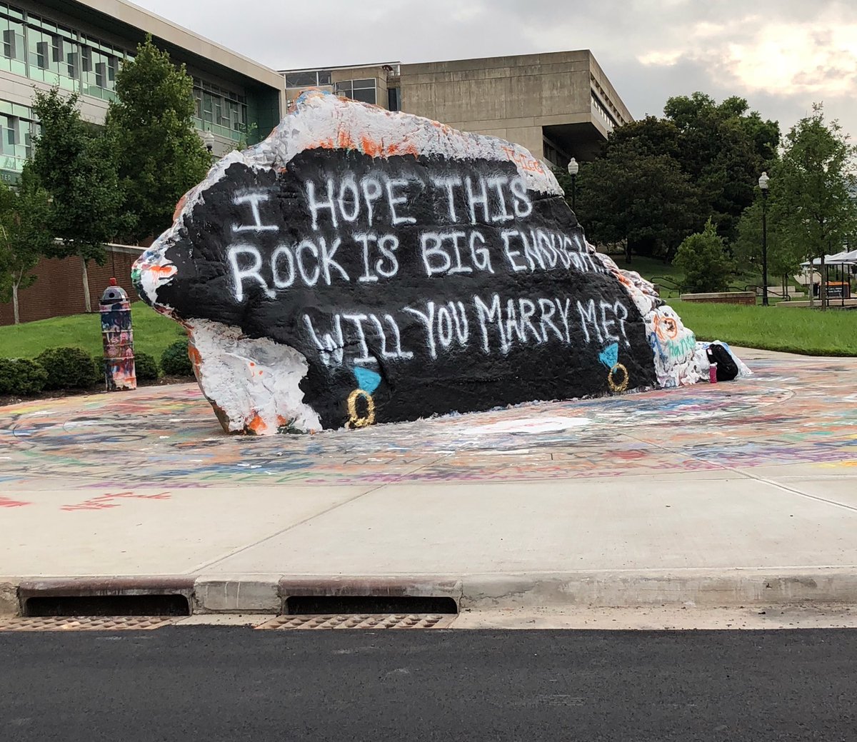 Painted on the Rock at UT: “I hope this Rock is big enough. Will you marry me?”