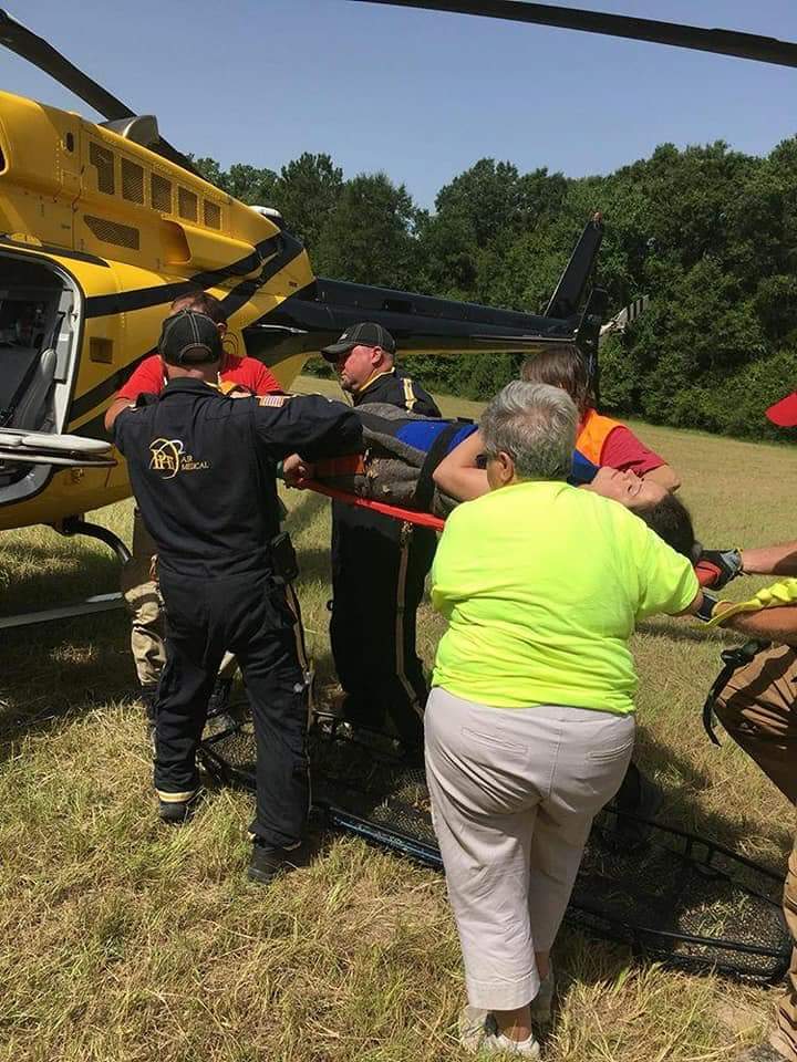HFDK9SAR's tweet photo. Loading the victim in the helicopter. https://t.co/VsK5CRaZ3C