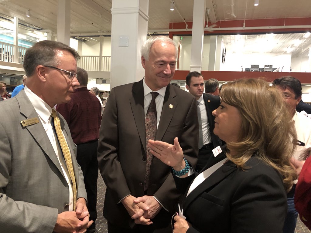 UACCB's tweet photo. Chancellor Frazier visiting with @AsaHutchinson and Phil Baldwin at the new Independence Co. Library. What an amazing new space that will benefit our community! #experienceindependence #UACCB https://t.co/VUMtnM08ig