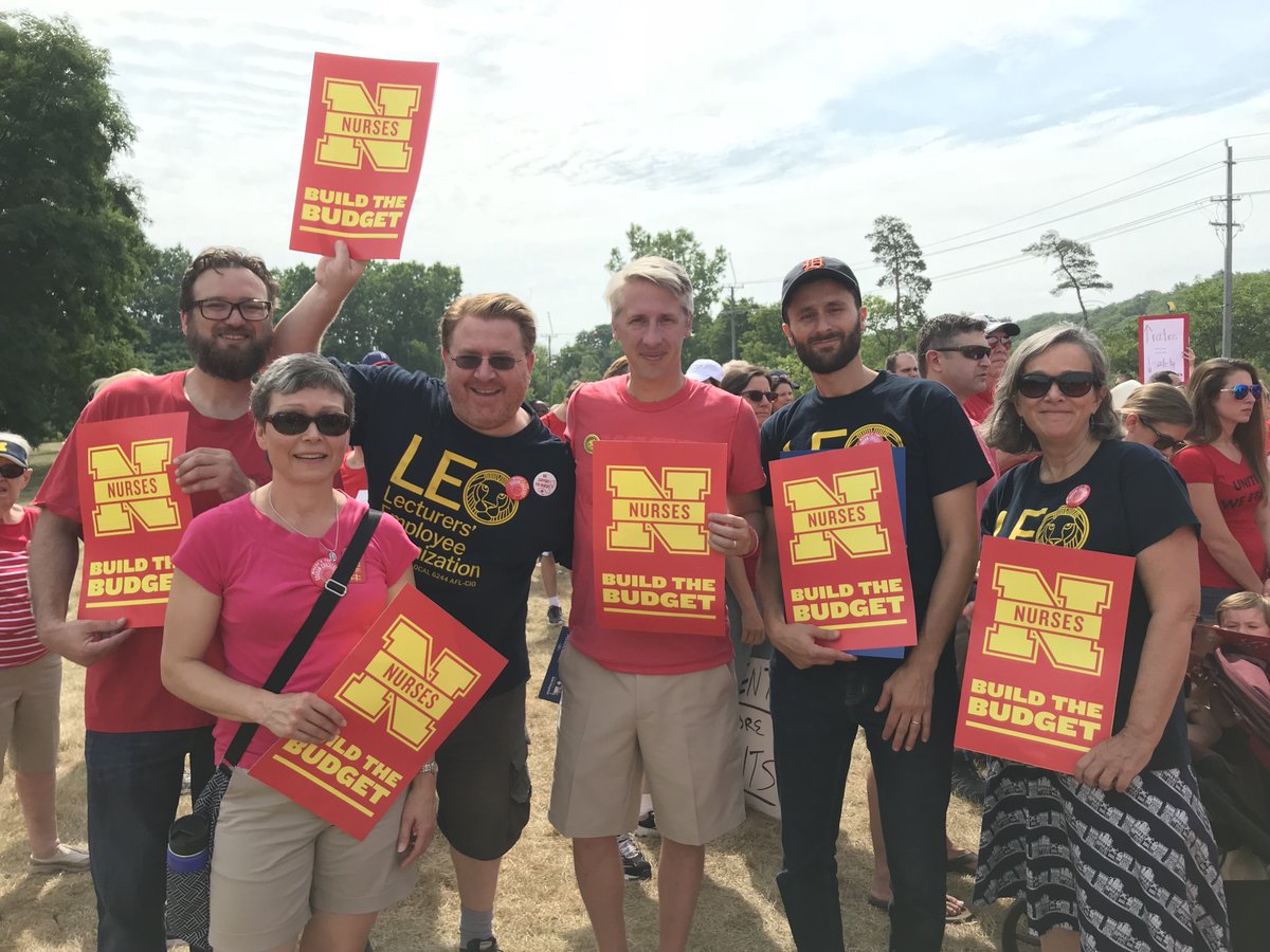 GoBlueVoteBrown's tweet photo. This weekend I marched in solidarity with hundreds of my union brothers and sisters at the UofM nurses rally for fair contracts! #UnionStrong #GoBlue #GoBlueVoteBrown #BuildTheBudget https://t.co/xdKHZPlQmV