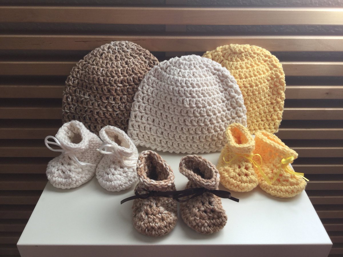 New to my store: assorted beanie - booties in cotton, newborn, 0-3 months.  Cream, spotted brown, and yellow ready to ship.  Will make blue and pink ones soon! Contact me if you need them sooner.  $15 set etsy.me/2uu3HEd #babycrochet #babybooties #babyshower