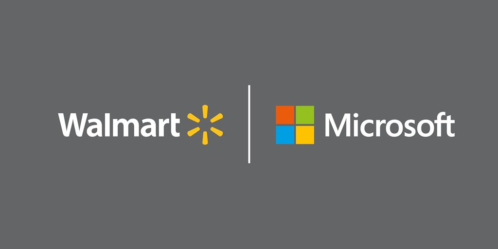 Walmart logo followed by a Microsoft logo on a grey screen