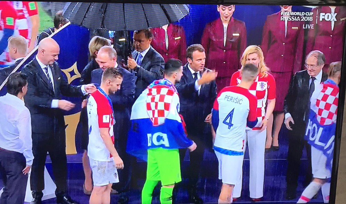 #FIFAWC2018Final; 3 country presidents, drenching in rain,not perturbed and wanting for umbrella,which was there finally. They kept on doing their job;guess if it happens here;officials had been sacked for not predicting n holding event under a shade by terming it mismanagement!