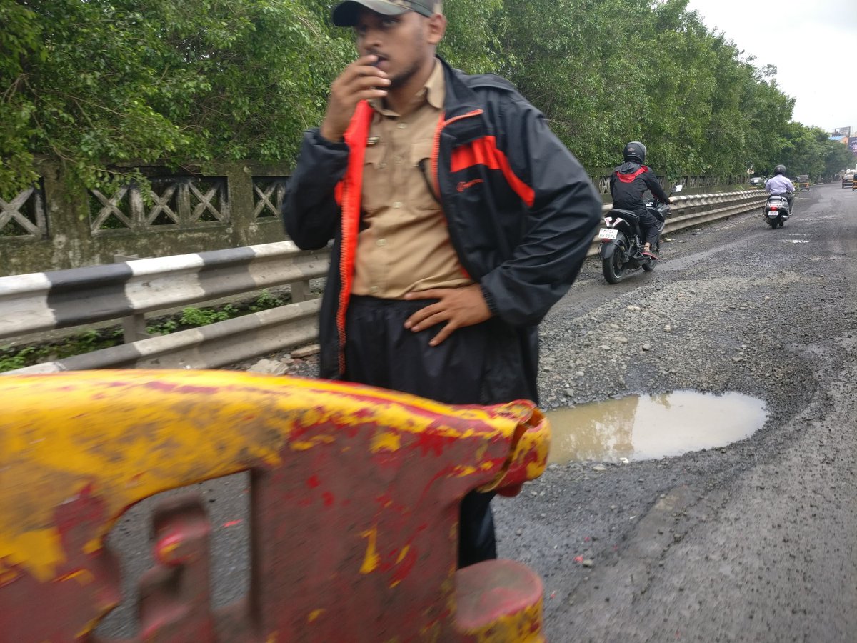 parkar4u's tweet photo. @CMOMaharashtra @PMOIndia @MMRDA_TWEET 
Already the kopri bridge at thane is of two lanes and one lane towards mumbai has huge holes like this...
Will u take action post few more die at this spot? Also do u guys reply only if some celebrity tweets...har jagah trp chaiye kya? https://t.co/xuZcKqX2hv