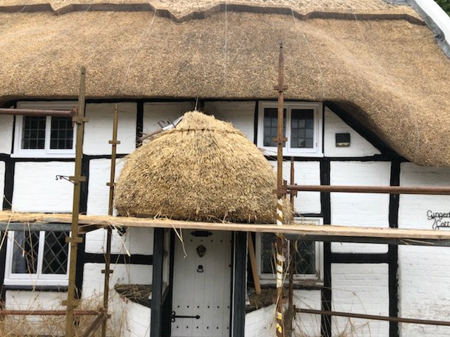 TWThatching's tweet photo. Porch coated, ridge nearly done ready for wiring &amp; dressing up, ending with the eaves being cut sharp. Afraid can't find a #thatch emoji for #WorldEmojiDay https://t.co/8QvoeKgJXa
