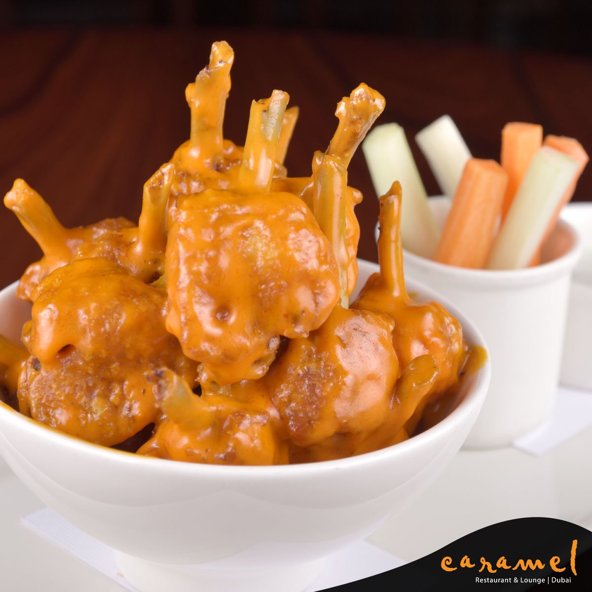 carameldubai's tweet image. You'll "love at first bite" our #BuffaloStyle #Signature #Chicken Lollipops served with a blue cheese sauce made for dipping. Happy Hour is in full swing and runs until close #caramelgroup #carameldubai #DIFC #HappyHour #HappyHourDubai