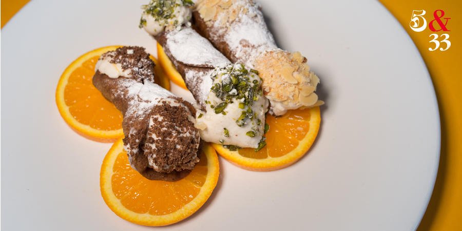 We eat dessert first.. especially if it is our homemade Cannolo Siciliano. Enjoy our Sicilian Summer menu at 5&amp;33 🍊.
