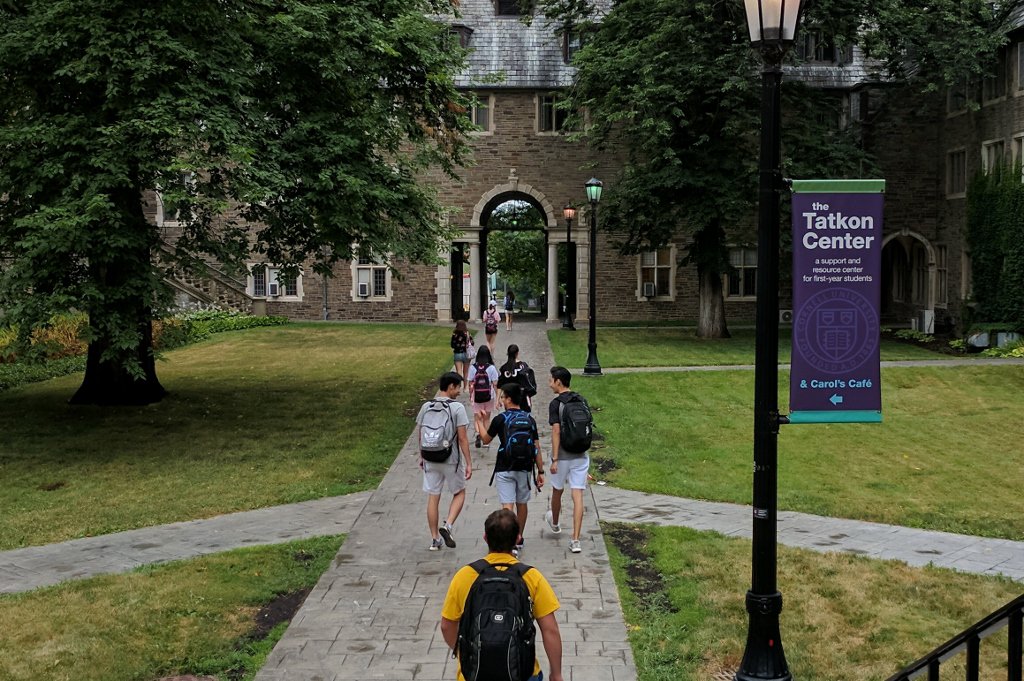 Students with backpacks walking on North Campus