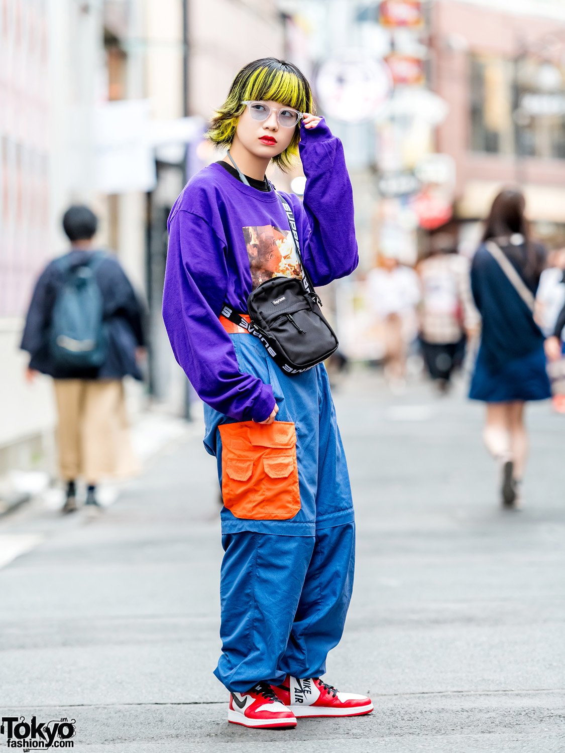 Tokyo Fashion on Twitter: Tokyo on the street in Harajuku wearing an O.U.T. "Bonfire" sweatshirt with vintage track pants, Nike Air Jordans &amp; Supreme crossbody bag #原宿 https://t.co/cHe2GfdHU0 https://t.co/f49gFQpBTh" /
