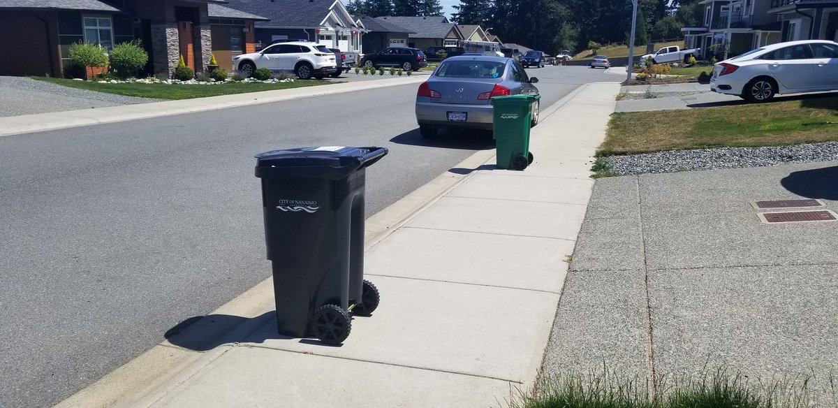 track10films's tweet photo. @cityofnanaimo clarification please. Driver did not pick up yesterday because I was apparently too far from the curb. This is what I left out yesterday. Can you please clarify how close I'm supposed to leave it???? Do you literally want it on the street? https://t.co/6MFbmlagJX