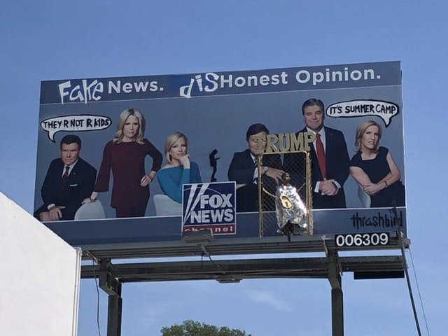 Stop_Trump20's tweet image. Someone fixed a fake news billboard in Atlanta