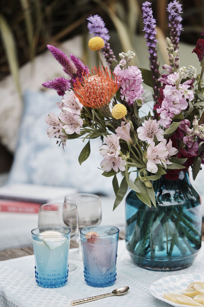 BloomandWild's tweet photo. Brighten their week with this carnival of colour. The Lana is bursting with bright yellow craspedia, red leucospermum, scented stocks — and much more: https://t.co/cfPt8LIcrA https://t.co/jRFIP0566Q