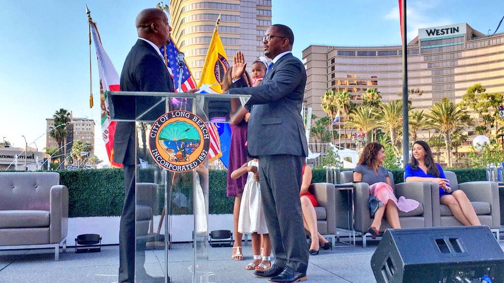 LongBeachMayor's tweet photo. .@RexRichardson, of the Ninth District, is joined by his wife and daughters while being sworn in by his uncle  #LBInauguration https://t.co/iGHKe6emjZ