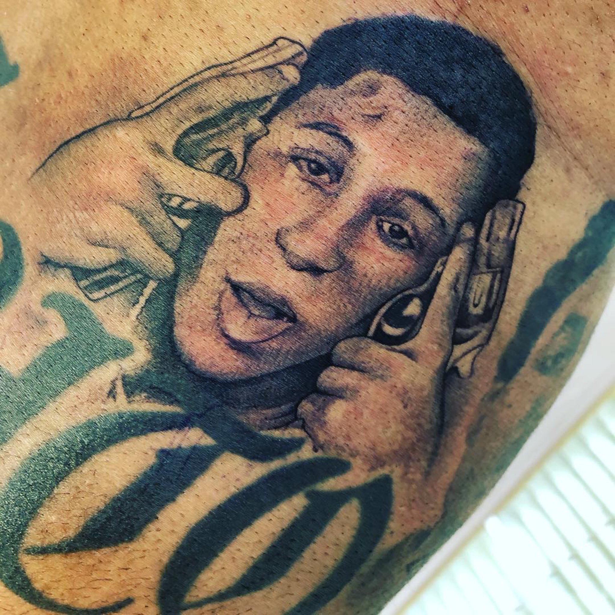 Did Kevin Gates get a tattoo of NBA Young Boy? 