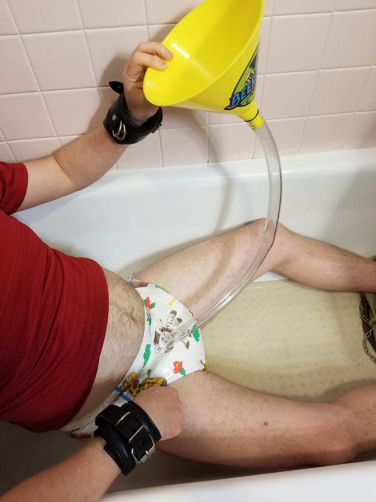 BondageLand's tweet photo. Having a soggy day with @DominaCamilla!!! #communaldiaper #communal #sharingiscaring #nopotty https://t.co/nvfHHiCqni