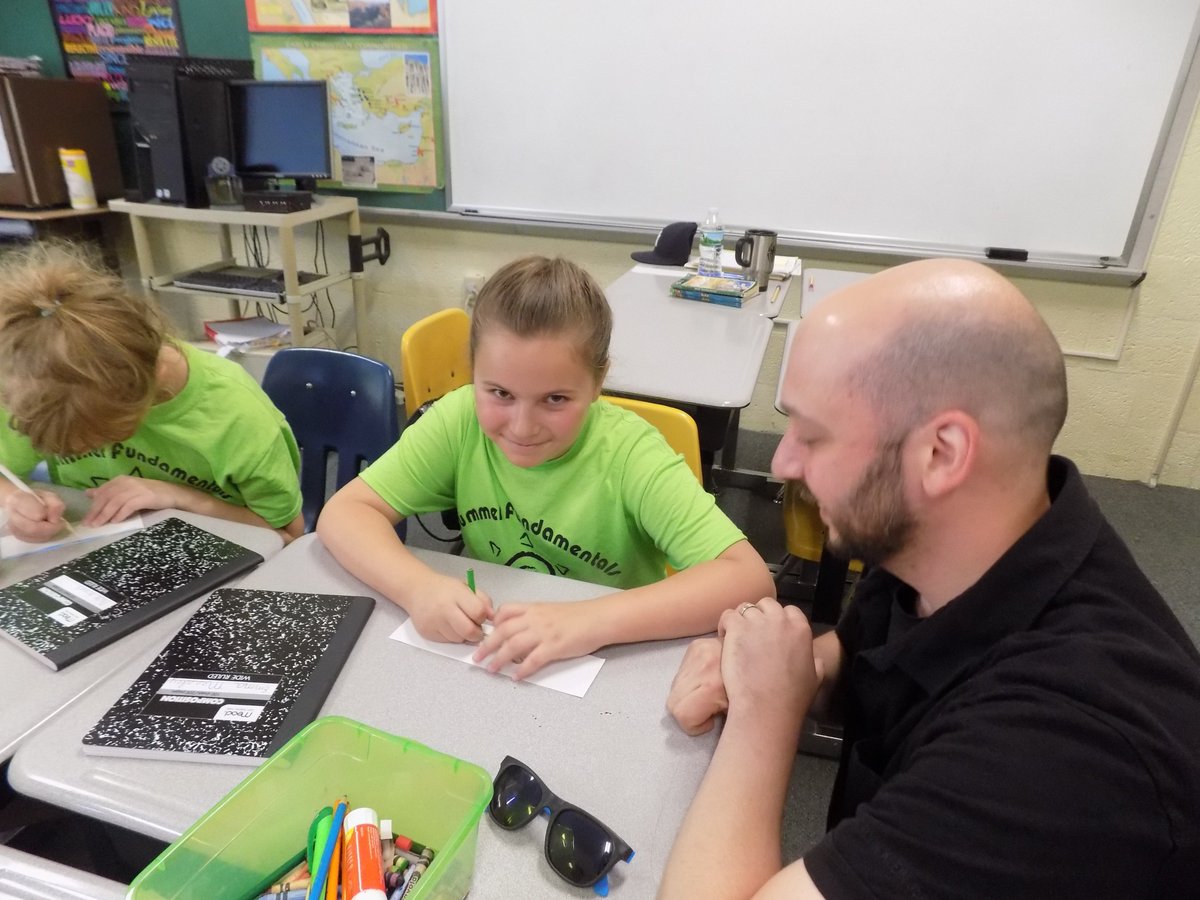 BishopDunnMem's tweet image. Chris Ciulla, MSMC grad student, works with campers in our SumFun academic program on writing skills to complete his practicum. #MSMCNY #BDMS_SumFun