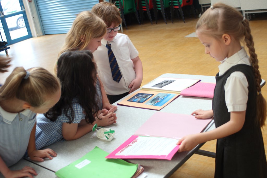 Parkfield's tweet image. Children enjoyed looking at all the #LearningLog homework in the hall this morning.