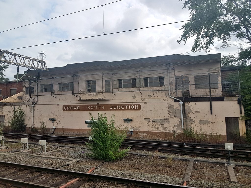 ToursByTrain's tweet photo. South of Crewe (sorry), despite the disused 'box the railway is a hive of activity. An @elizabethline train on test and Basford Hall yard packed with infrastructure trains. ^PK
#BoxShot #MidweekMidlander https://t.co/kNoyRCZsxU