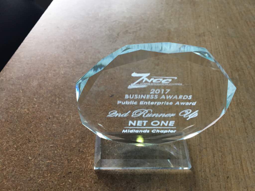NetOneCellular's tweet photo. #TeamNetOne just scooped the 2nd runner up Public Enterprise Award at the @zncc_chamber Midlands Chapter. We are indeed taking this #Giant to #AnotherLevel https://t.co/QZt40RXFl3