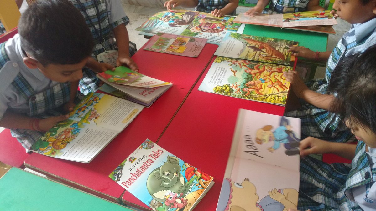 JyotikaMorris's tweet photo. Story time for the Little learners of rgs Noida totally engrossed in story books doing picture reading #imaginativeskills #learningskills #readingskills #picturereading @rgsnoida @supritichauhan @sonambakshi @sujatapurkayas @gaytiri @nirupasingh https://t.co/GwcQ75QcaA