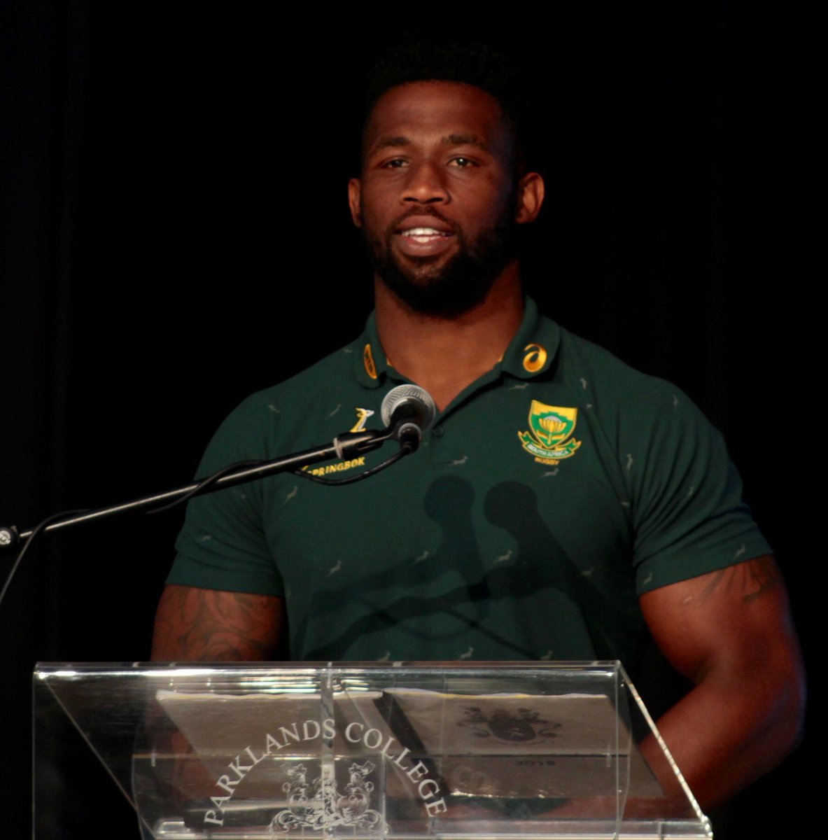 SSteyn's tweet photo. What an incredible privilege the learners at Parklands College enjoyed today with Siya Kolisi addressing them on Mandela Day.  He told the learners to make the most of their time at school. What a role model! #proudlysouthafrican #parkiepride #springbokrugby https://t.co/O0wQQyQllM