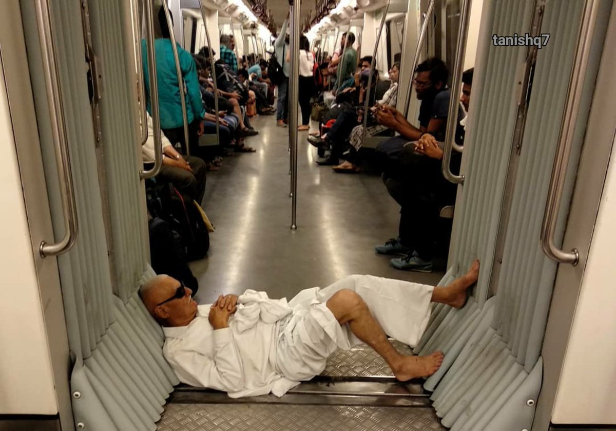 tanishqmalhotra's tweet photo. Mohandas Karamchand Gandhi Delhi metro, 2018 ( colorized ) https://t.co/E2cYkQsSp2