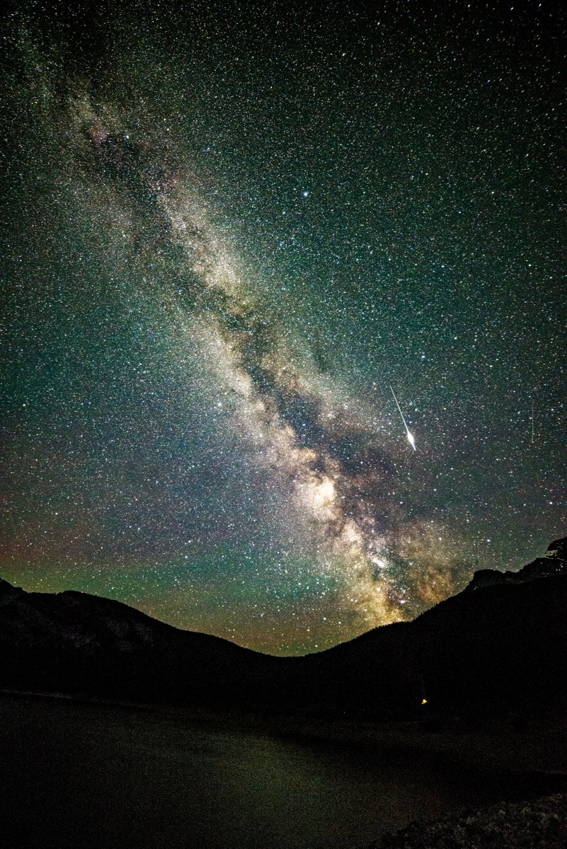 attila_thefun's tweet photo. Milky Way over the lakes with an Iridium flare and my campfire in the  distance. #kananaskis #albertapark #MilkyWay https://t.co/I3JzoHHUfv