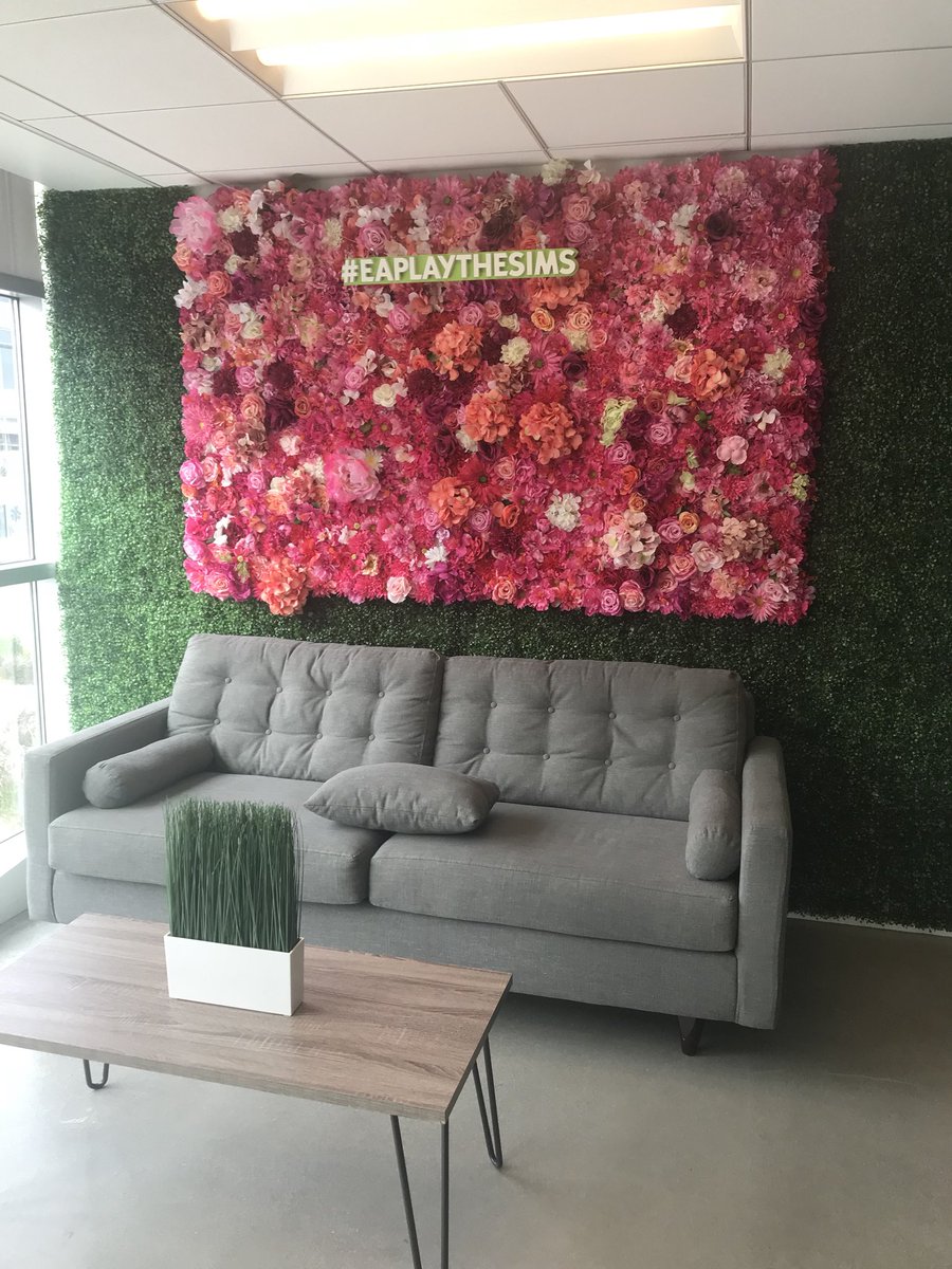 SimGuruiluore's tweet photo. Visited @EA LA. Looks like they reused the photo wall from @EAPlay  @TheSimsMobile @TheSims  booth for office decorations 🧐. #recycling #thesims. https://t.co/ZABhKFjSvt