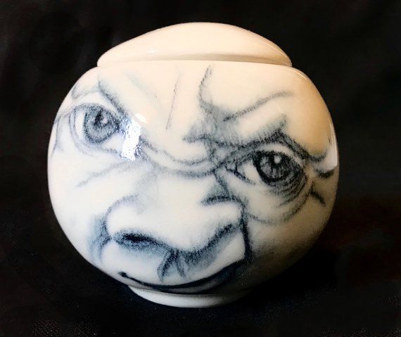 Pinterest buff.ly/2mKhL88  This old grumpy moon has all the answers and holds all your secrets. #moonpottery #whitejar #whitepottery #homedecor #maninthemoon