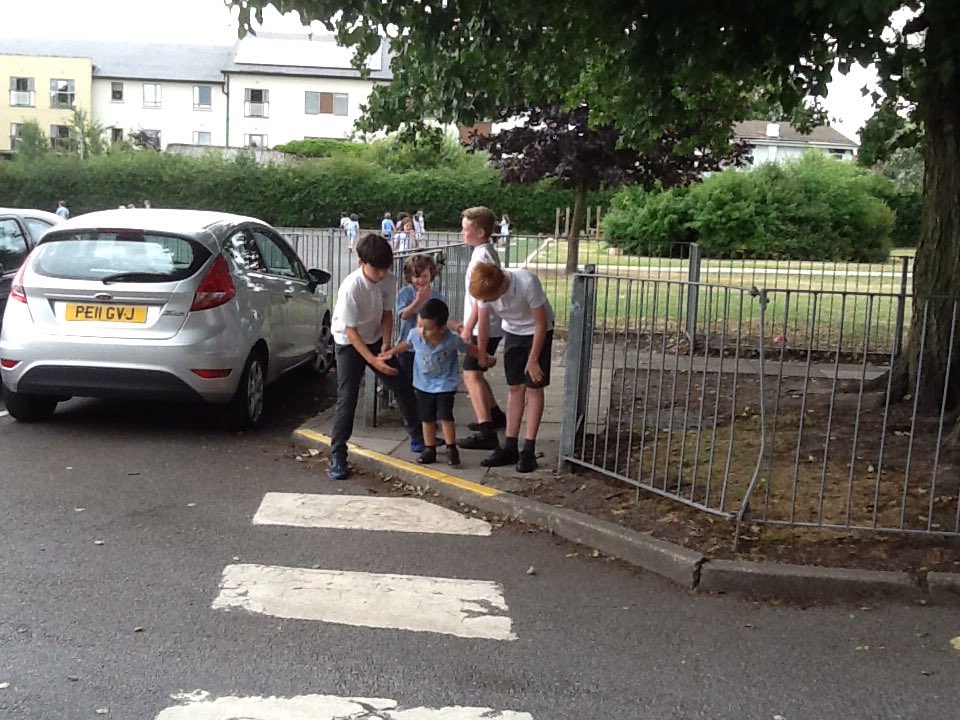 StAnnesFS's tweet image. Year six buddies teaching our Reception children how to cross the road safely! #stoplookandlisten #RoadSafety