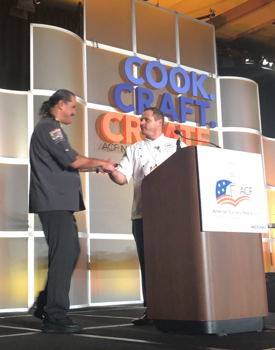 GBACF's tweet photo. Chef Eric Yeager, President of the GBC, presenting ACF National President DeCambra with a check for $2500 to the AAC Inspire Fund for the USA Youth Teams! #bethechange #acfchefs #greaterbaltimoreacf #cookcraftcreate https://t.co/R35rrs7KSC