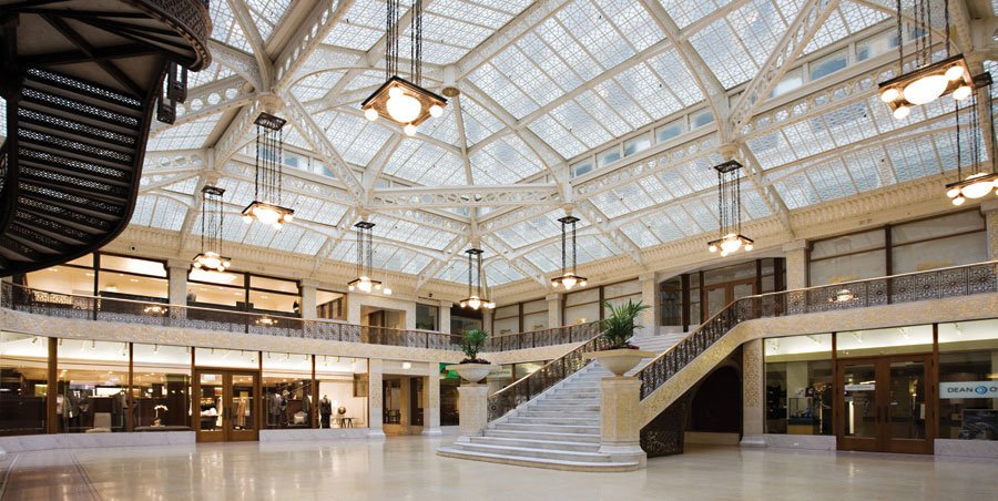 GlassConGlobal's tweet photo. When you're in Chicago this Sept. for #GCG2018, be sure to stop by the Rookery in the downtown's Loop, which was designed in 1888! The Rookery features a bright, two-story interior light court with a glass ceiling. This building definitely needs to be toured by architecture fans! https://t.co/P8NrJzScrT