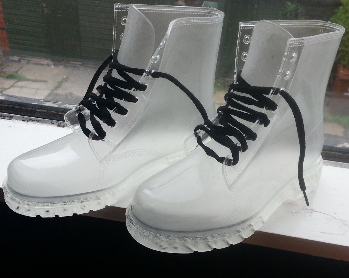 http://toocooltobehipster.tumblr.com/post/51652218394/doc-marten-style-transparent-rain-boots-for