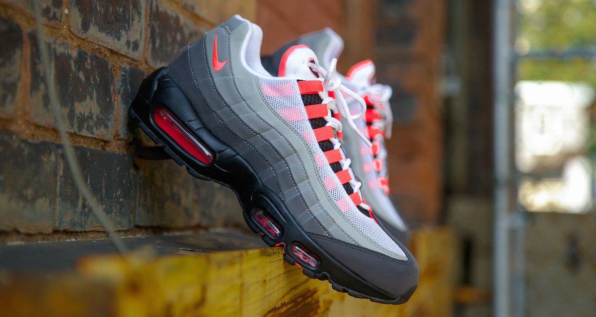 air max 95 solar red on feet