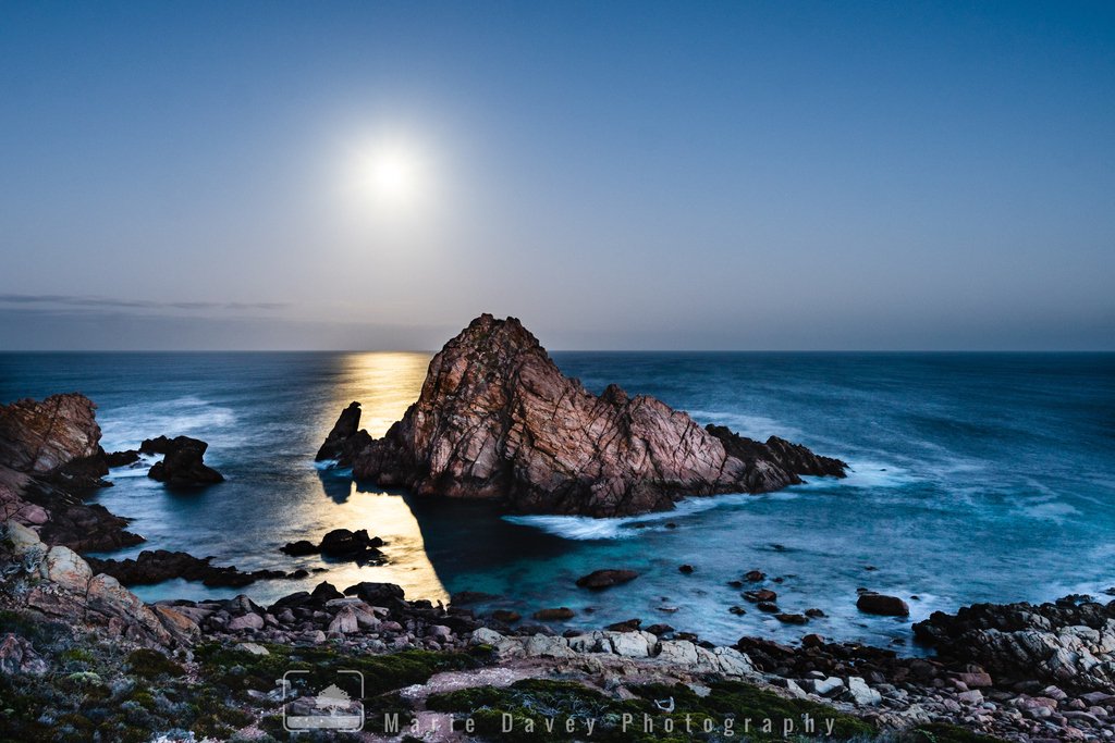 One of those beautiful, unexpected moments; my husband, brother-in-law &amp; I all took a trip to Sugarloaf Rock in WA, to photograph sunrise. When we arrived we saw the most spectacularly bright moon I have ever seen. The light it cast on the water was amazing!

#photography #moon