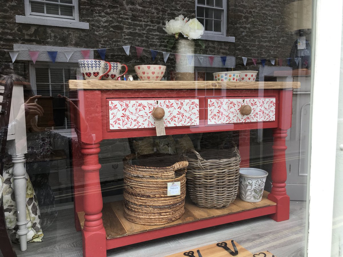 In the window of the SMALL Corbridge shop fab red console / kitchen unit / anywhere item / statement piece #furniture #furnitureforsale #stencil #Interiors #red #RusticFurniture #Corbridge #northumberland