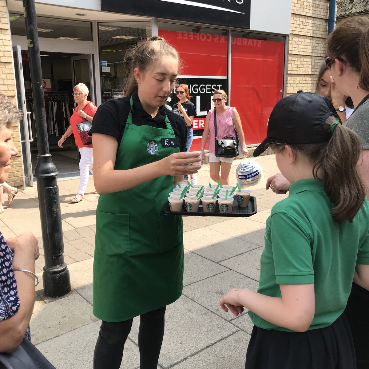 Third outing of sampling, Emily giving out iced lattes! #yummy #summer ❤️