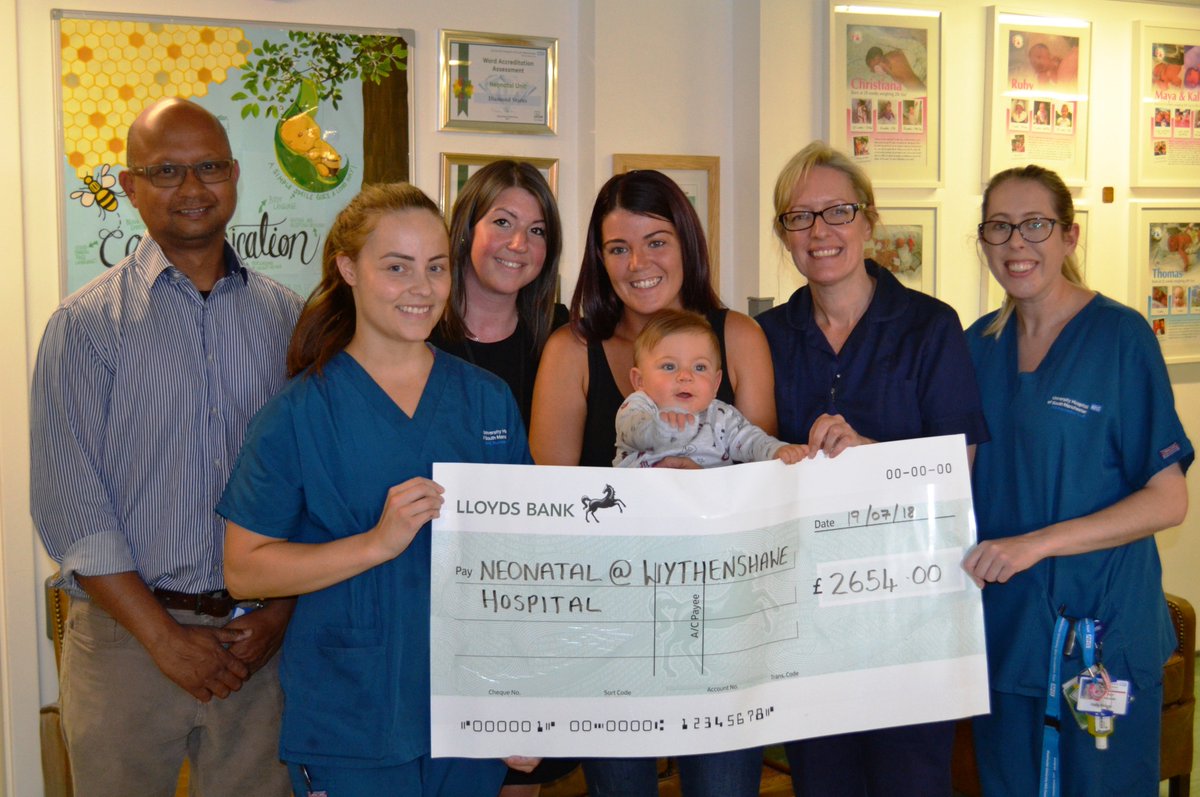 WythenshaweHosp's tweet photo. Carly Calland &amp;  10 month old Jaxley visited our Neonatal Unit today to present a cheque for £2,654. Jaxley spent quite a bit of time with us after he was born and to say thanks Carly &amp; her friends &amp; family have raised more than £2,600 for the unit. Thank you so much Carly &amp; co! https://t.co/qQIIXUjsTg