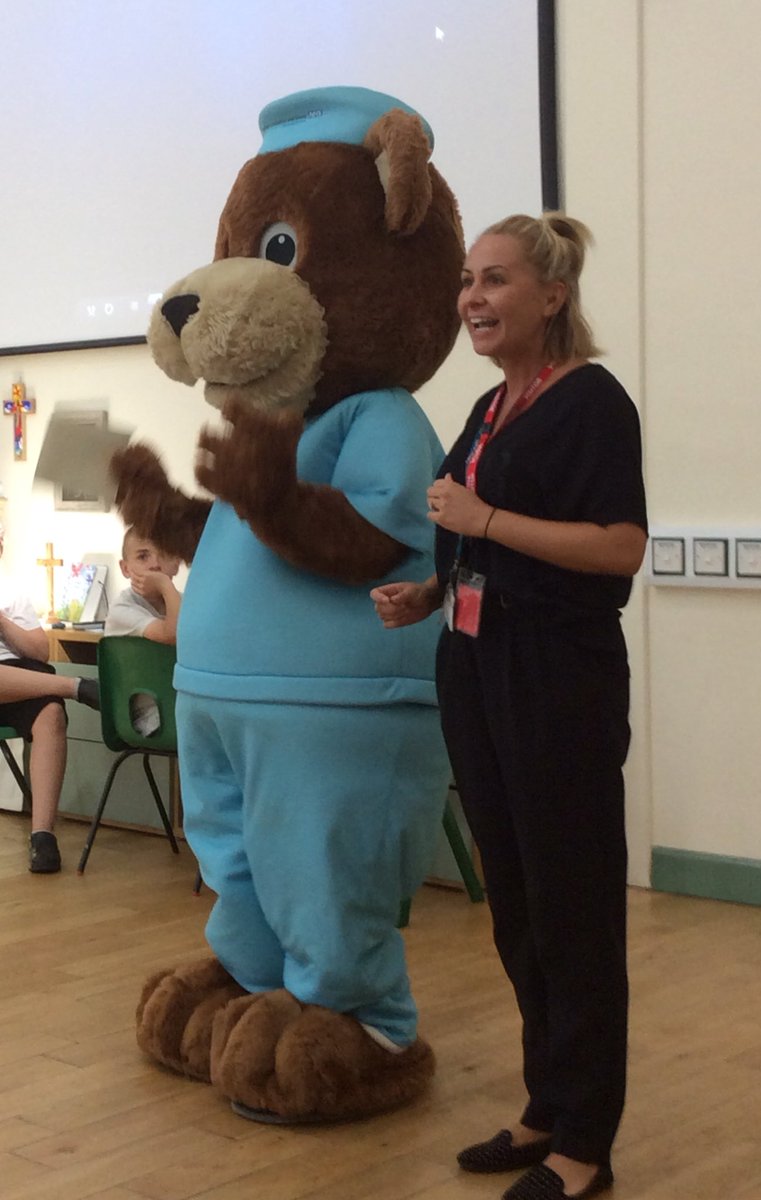 Lakeside_school's tweet photo. Special visitor in worship. Scrubs was really impressed with our support of NHS day; he came to say thank you. #healthtreefoundation https://t.co/QRipZshY05