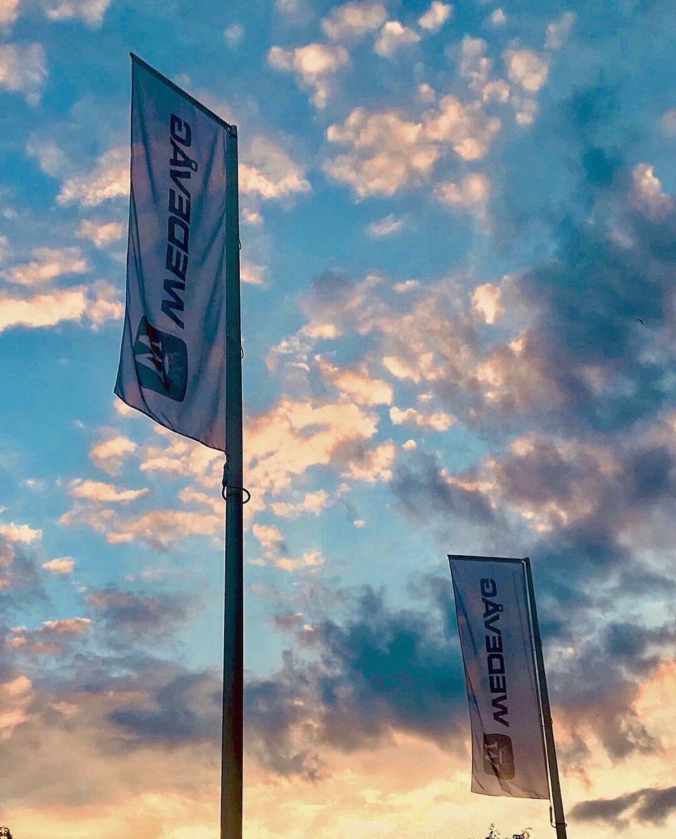 wedevag's tweet photo. Summer sunsets are beautiful at our factory, or could this be the glow from our birthday cake? 480 years worth of candles gives off quite a glow. 

If you’re in the neighborhood stop by for slice! https://t.co/SdSH83RIft