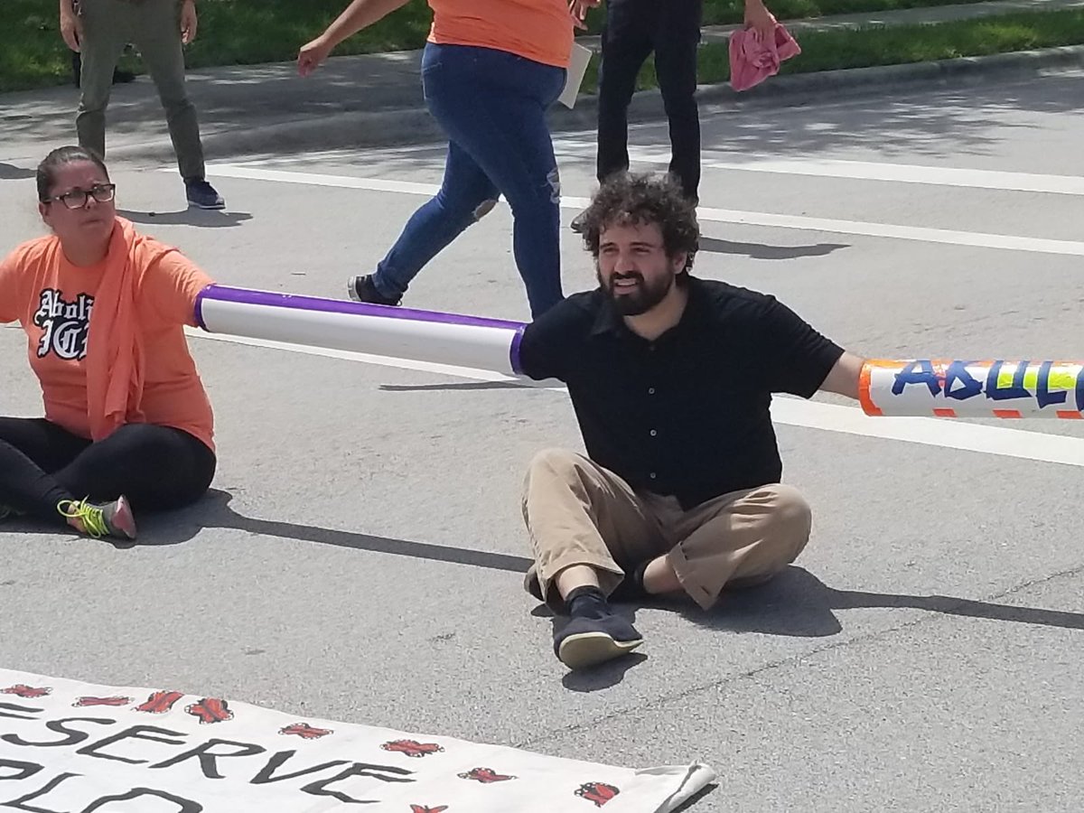 tomaskenn's tweet photo. Proud to be one of seventeen people who were arrested yesterday for shutting down an ICE facility in Miramar where people are screened and processed for deportation. Trump’s deportation machine has to be stopped. Another world is possible. #AbolishICE https://t.co/8sueosCmlw