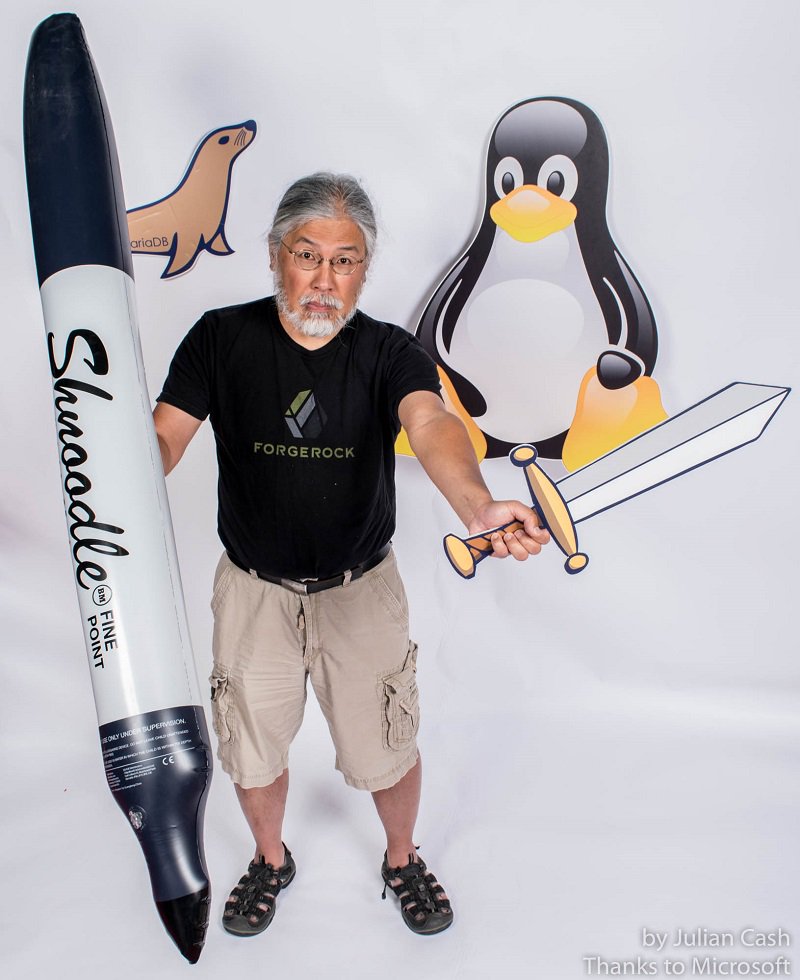 OpenAtMicrosoft's tweet image. Which is mightier? The pen or the sword... #DeepThoughts with @theMikeJang at #OSCON. #OSCON2018