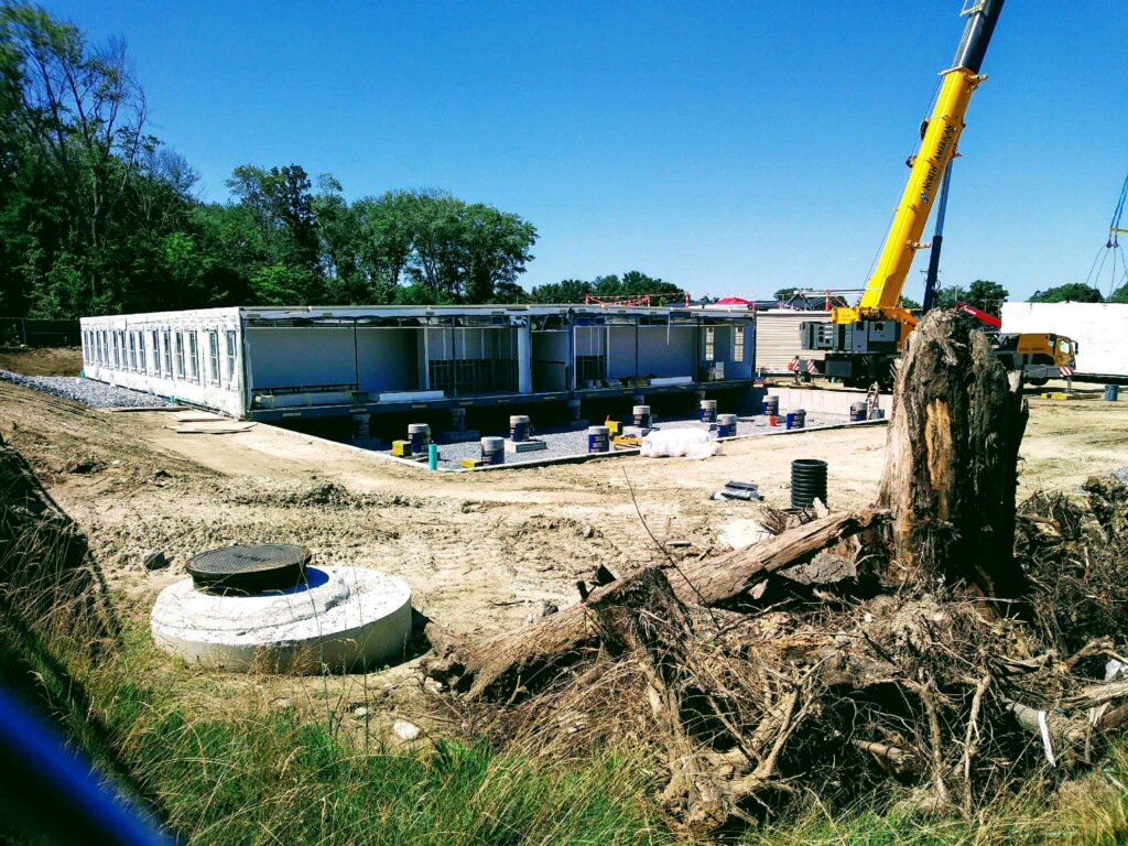 NA_ABECC's tweet photo. What a week for the ABECC! Only 4 more modulars to place tomorrow and our school will be complete with all modulars installed. The multi-purpose room (cafe and gym) has also been started as well. Everyone continues to work so hard for our opening in September!! We can't wait!! https://t.co/yfMtfqrsGh