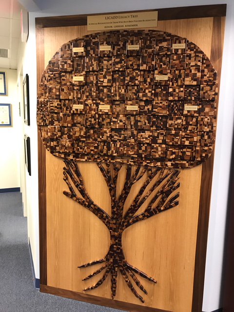 LICADD's tweet image. LICADD&apos;s Living Legacy Tree was crafted by hand from twenty varieties of wood and features the tribute, &quot;In special recognition of those who have been touched by addiction.&quot;  The name of a loved one, friend, or relative can be engraved and placed on the tree. #LICADD #legacytree