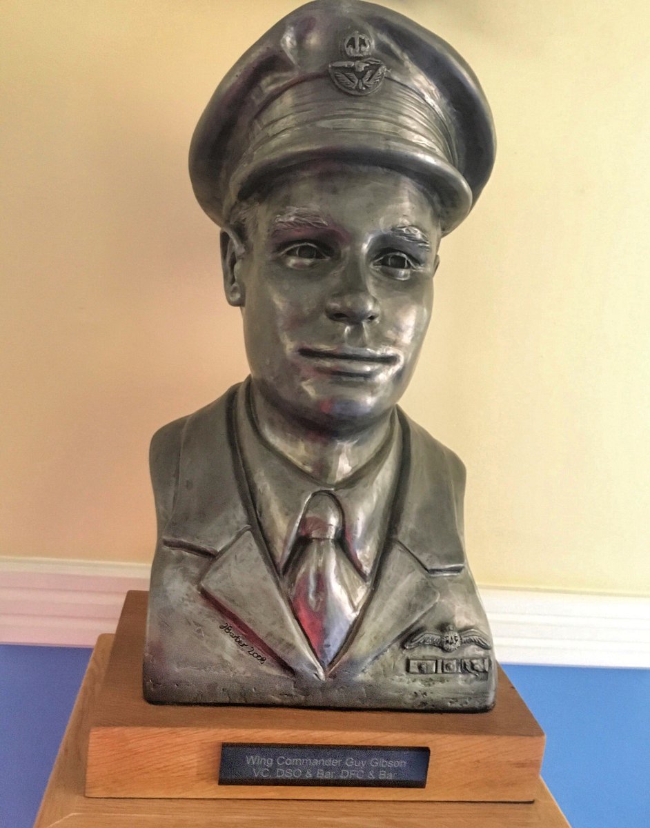 MikeLingPilot's tweet photo. At least when you’re waiting for an appointment in Station HQ at RAF Scampton there are magnificent things to see - this is the bust of Wing Commander Guy Gibson VC, DSO & Bar, DFC & Bar. We’re very lucky to be based at a station steeped in such history #Dambusters75 https://t.co/VP8toCIj2Y