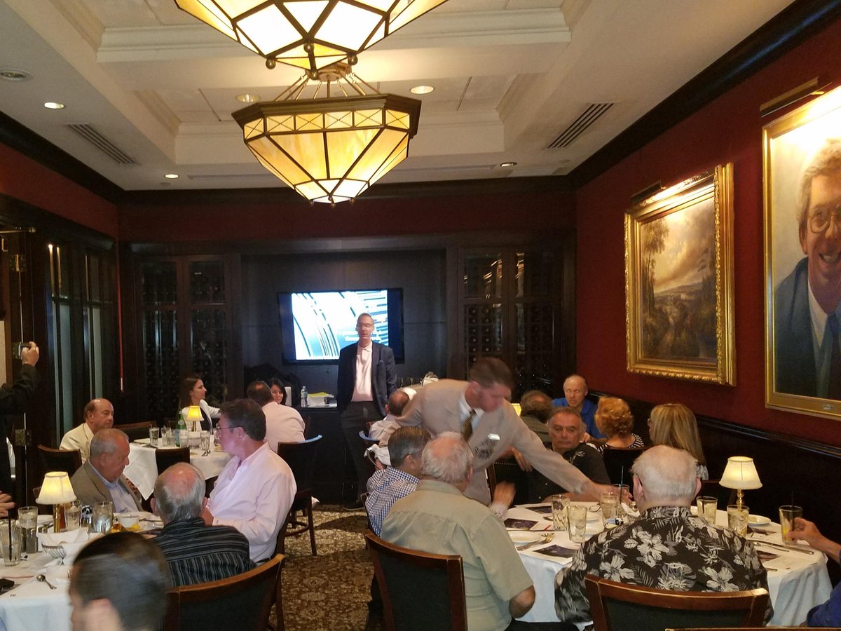 Qmage1's tweet image. Raymond Oliver-CEO at Bear Creek Capital
Technology Inventor and founder Leigh Rothschild CEO of Qmage presenting to another packed house in  South Florida